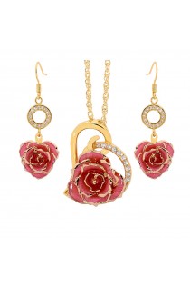 Rose trempée d'or avec ensemble de bijoux roses. Style coeur