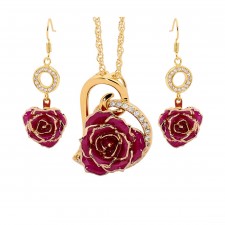 Rose trempée d'or avec ensemble de bijoux violets. Style coeur