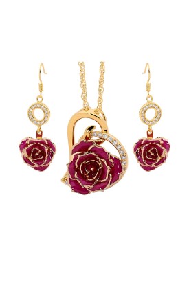 Rose trempée d'or avec ensemble de bijoux violets. Style coeur